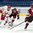SPISSKA NOVA VES, SLOVAKIA - APRIL 20: Ivan Drozov #6 of Belarus skates with the puck while Latvia's Toms Opelts #14 chases him down and Ilja Zulevs #19 defends during relegation round action at the 2017 IIHF Ice Hockey U18 World Championship. (Photo by Steve Kingsman/HHOF-IIHF Images)

